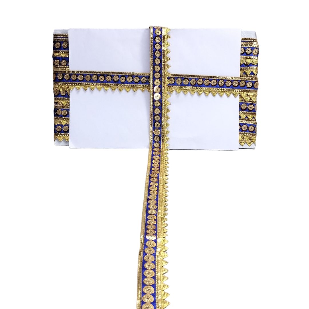 White fabric with blue and gold decorative border on a white background