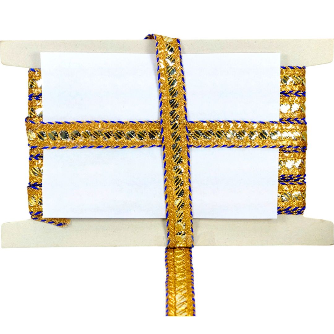 Decorative belt with gold and blue patterns on a white background