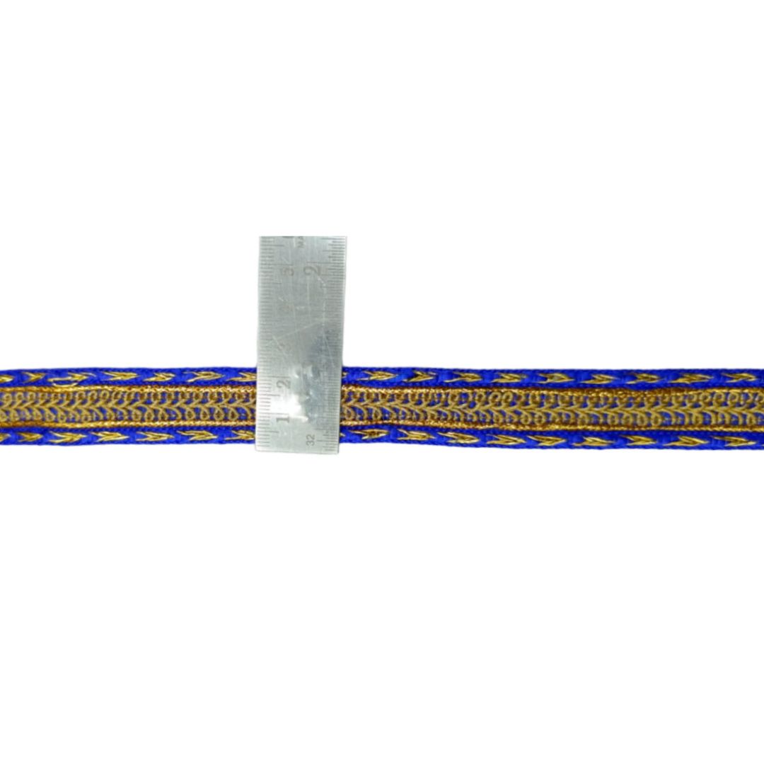 Blue and gold braided cord with a ruler for scale on a white background