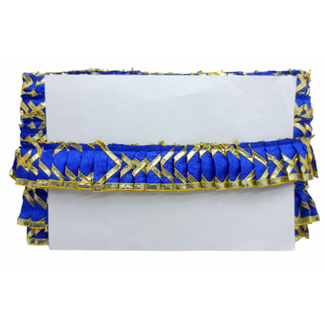 Blue clutch with gold accents on a white background