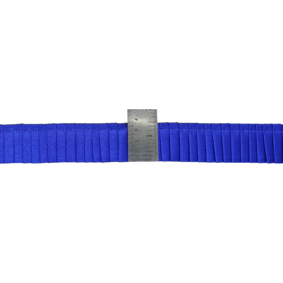 Blue belt with a metal ruler on a white background