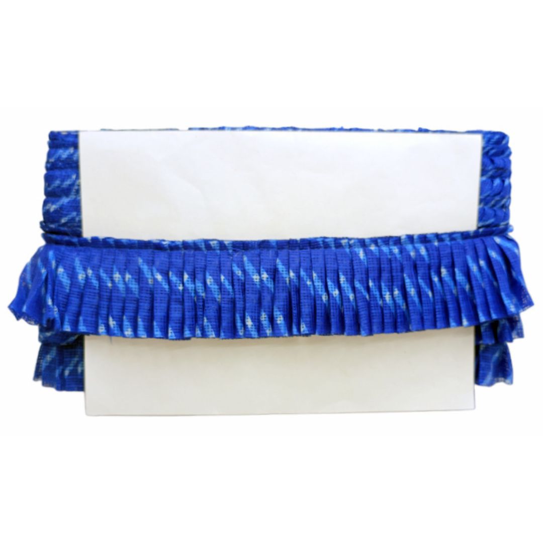 White clutch with blue ruffled edge on a white background