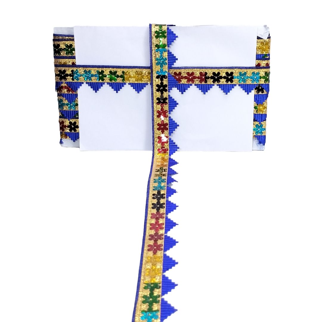 Traditional garment with colorful geometric patterns on a white background