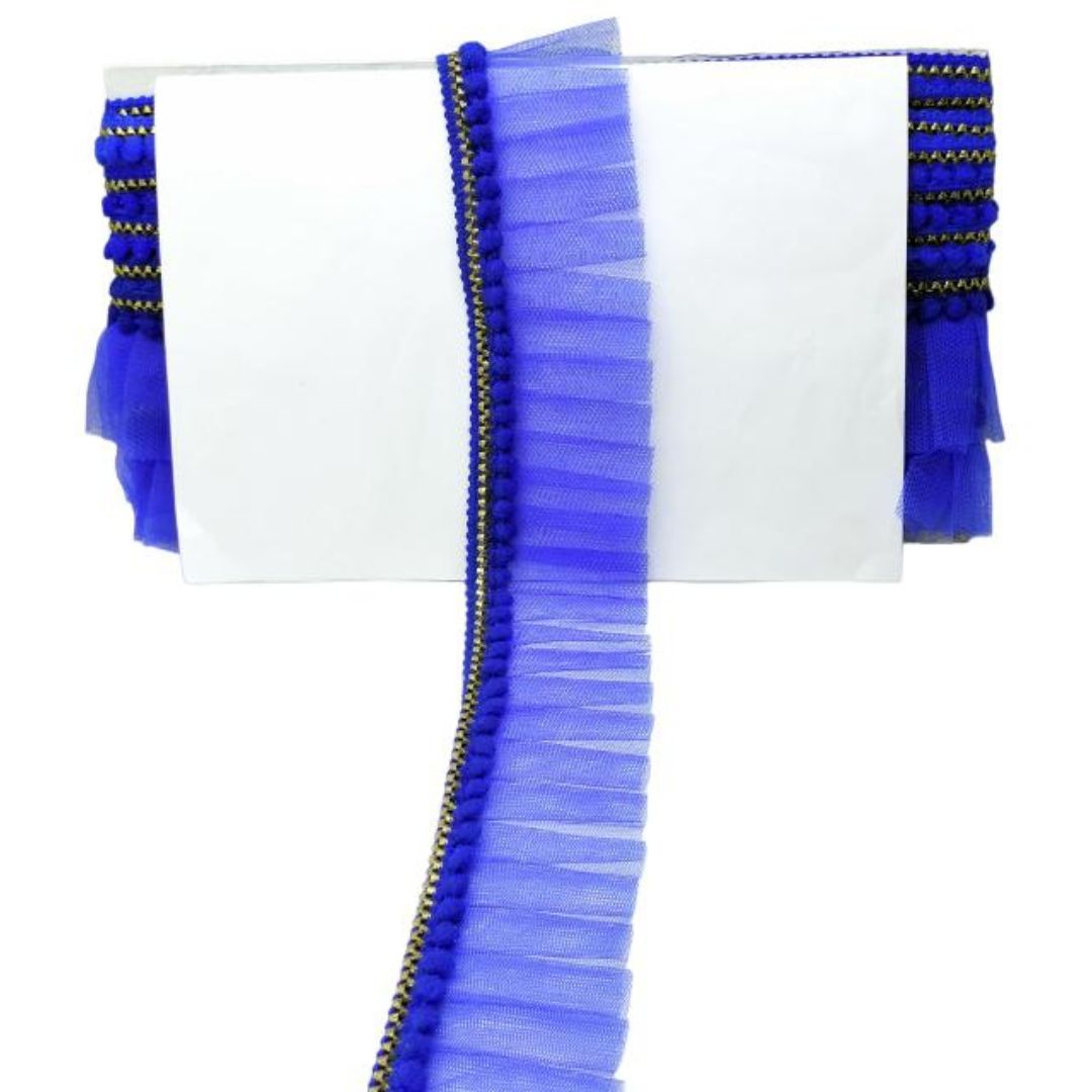 Blue tassel ribbon with gold accents on a white background