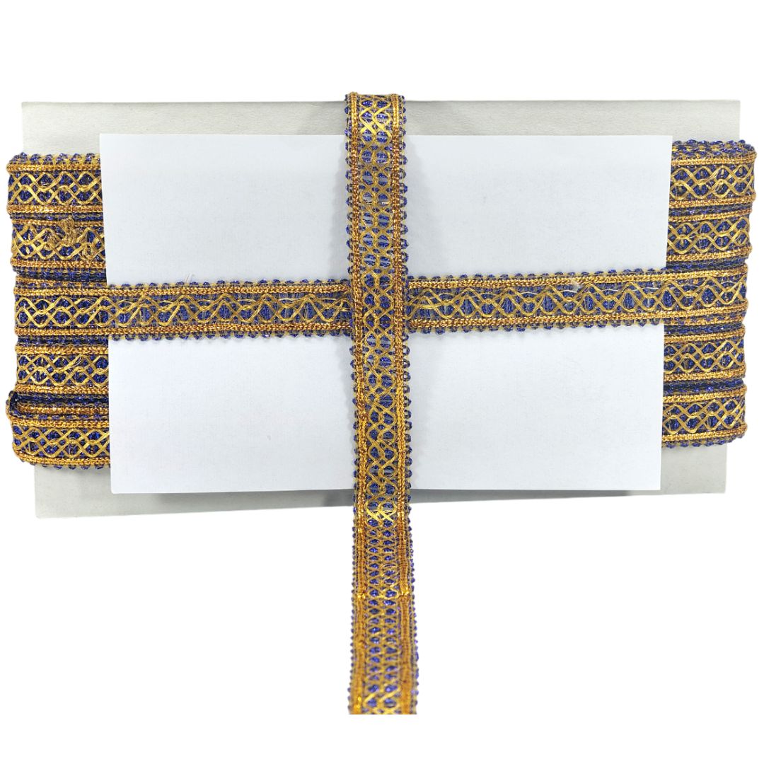 Decorative ribbon with gold and blue patterns on a white background