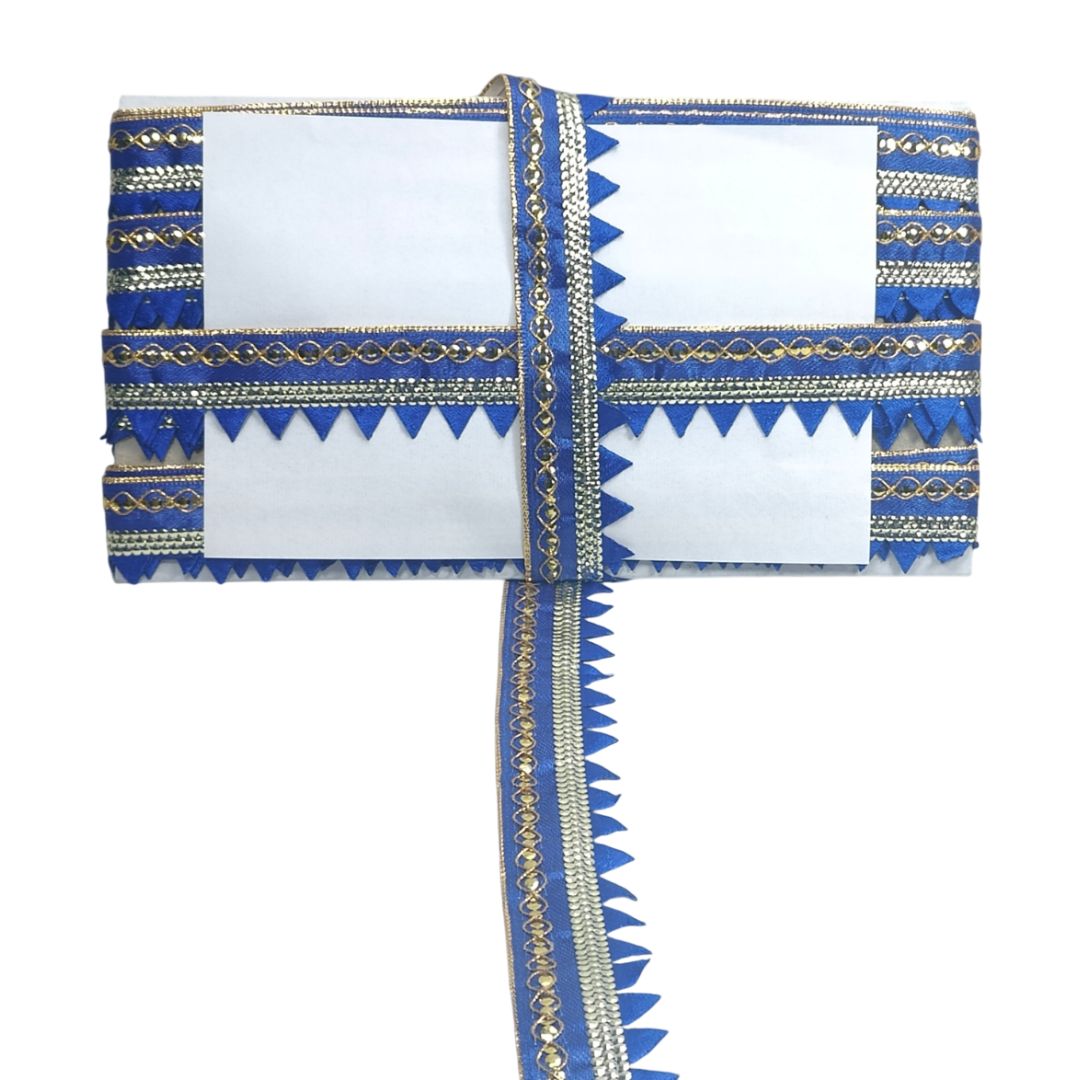 Decorative fabric with blue and gold patterns on a white background