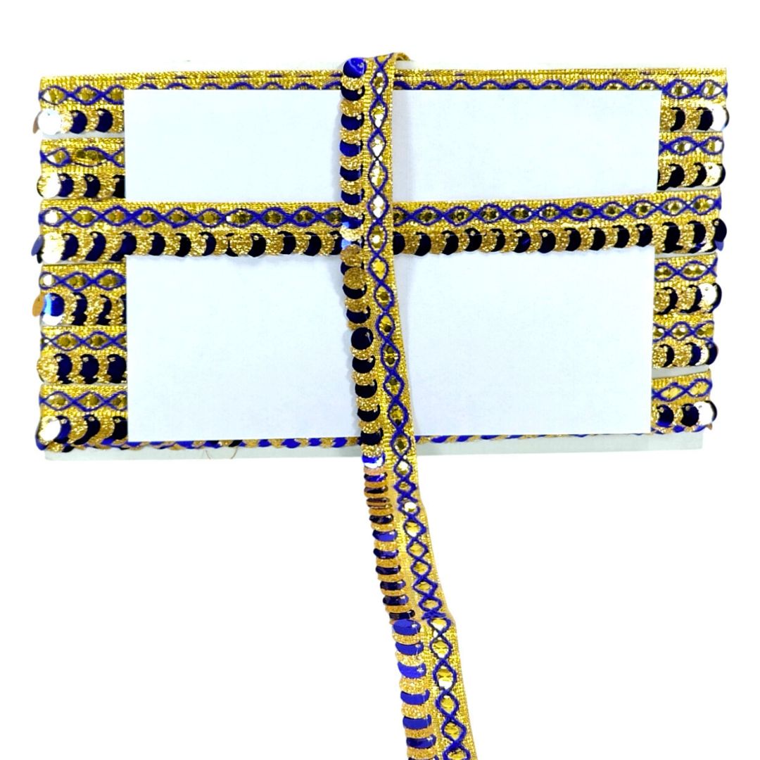 Decorative clutch bag with blue and gold patterns on a white background