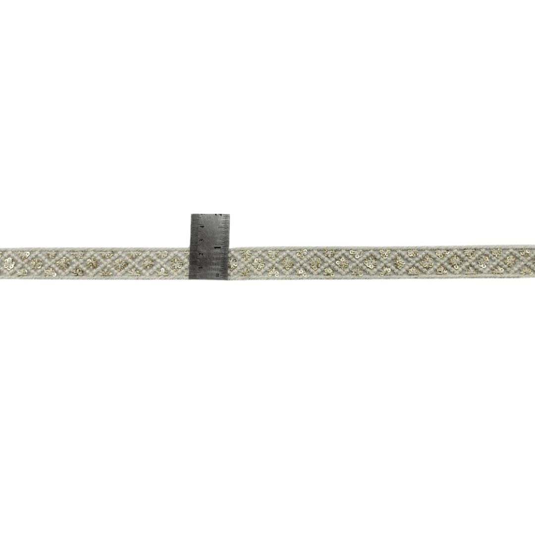 Textured belt with a ruler for scale on a white background