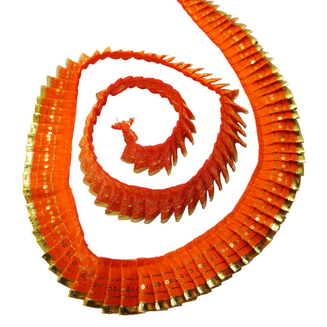 Orange decorative ribbon with gold trim on a white background
