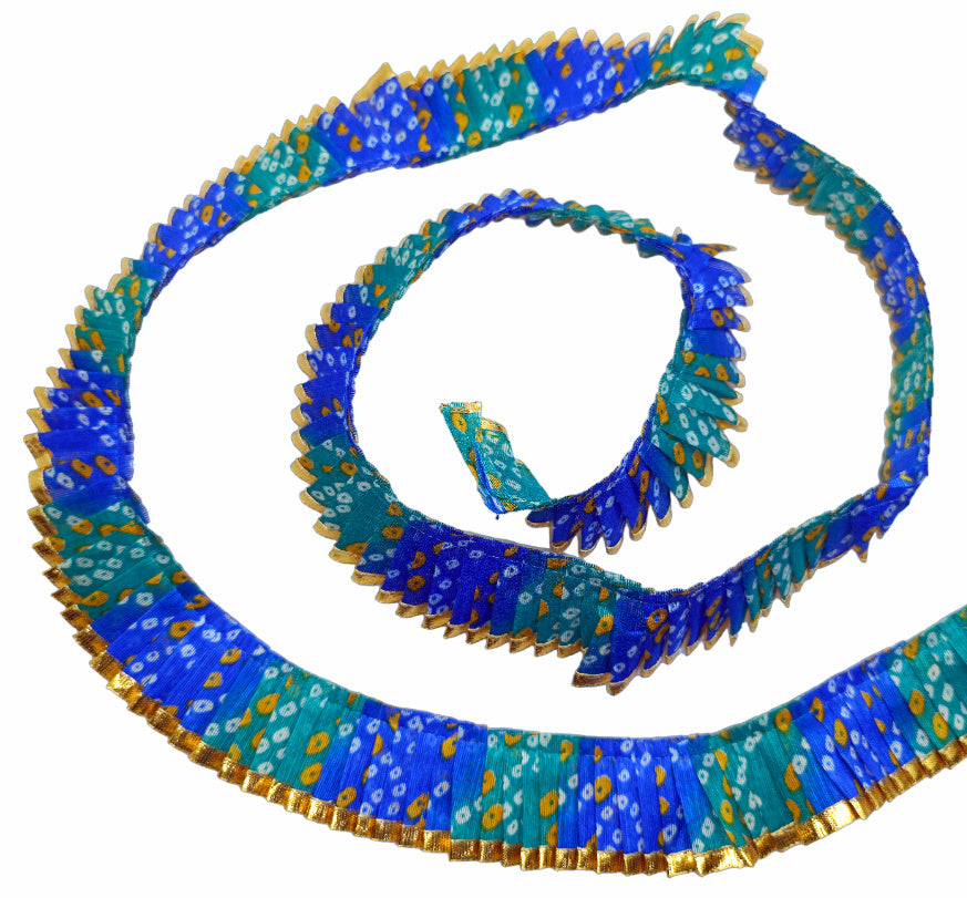 Decorative blue and gold ribbon with a spiral design on a white background