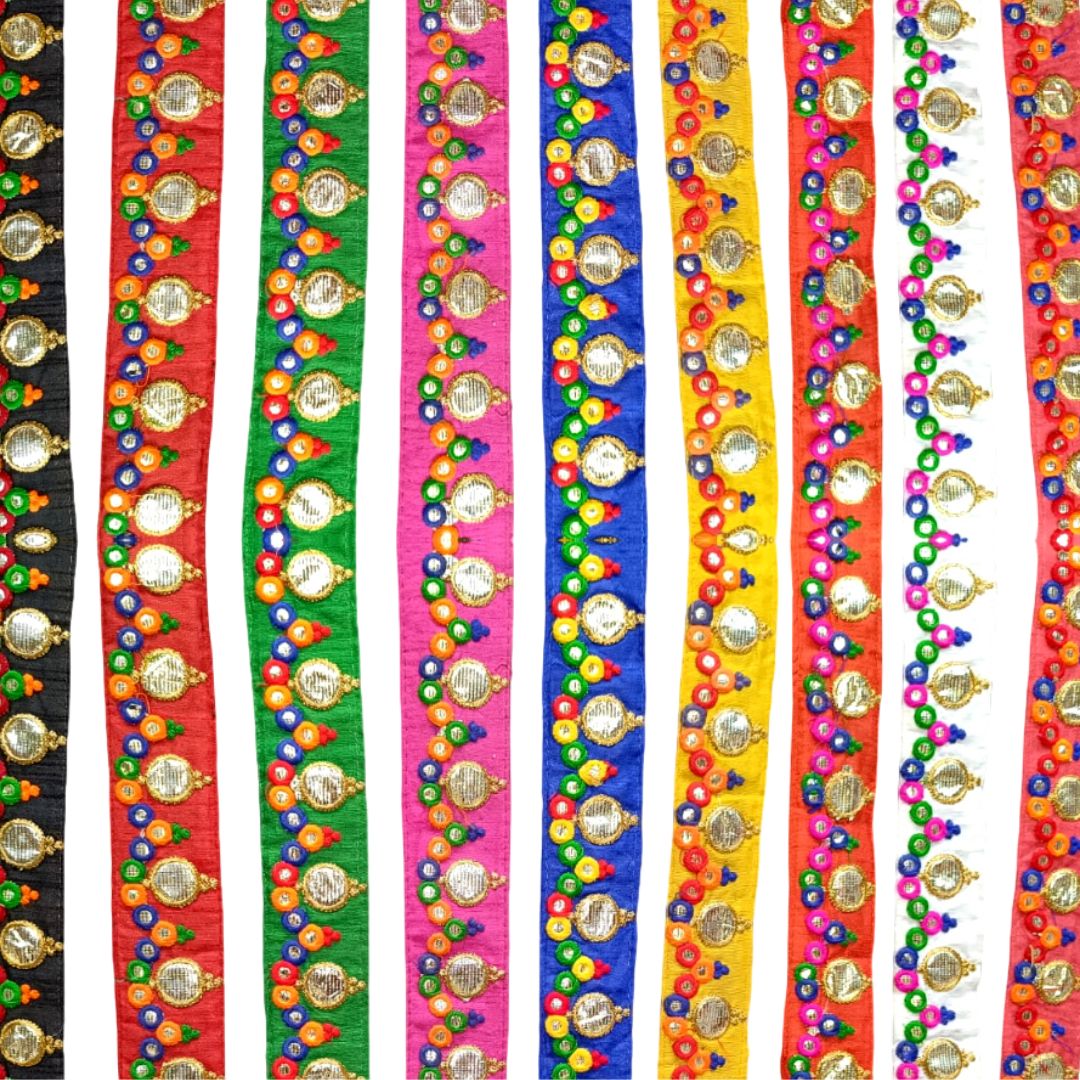 Set of colorful beaded necklaces with decorative elements on a white background