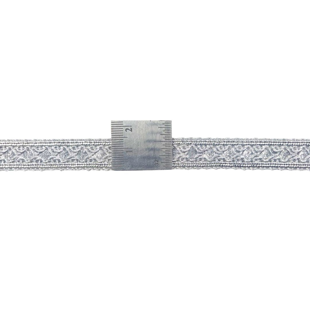Decorative ribbon with intricate pattern on a white background