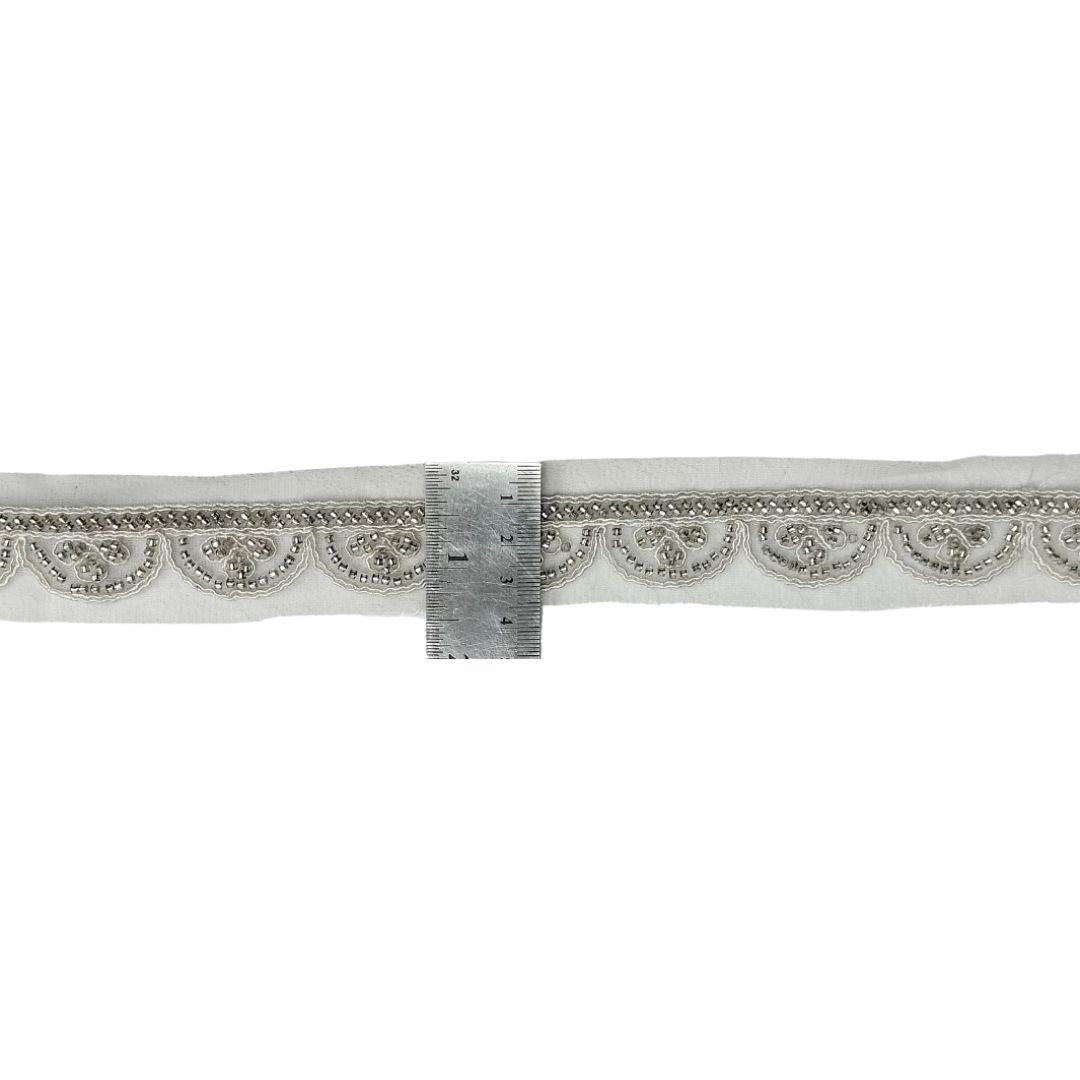 Decorative ribbon with intricate patterns on a white background