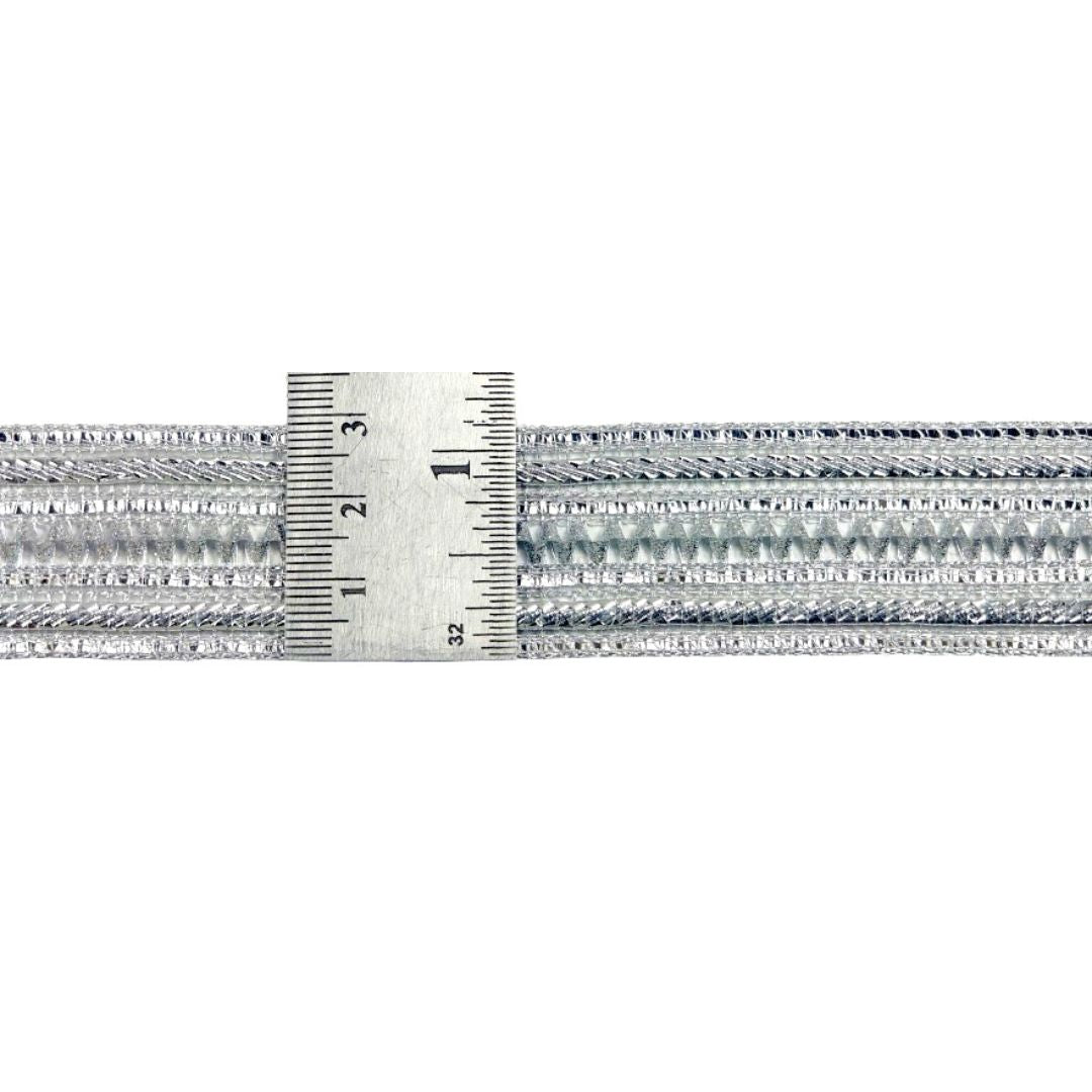 Three braided silver cables with a ruler for scale on a white background