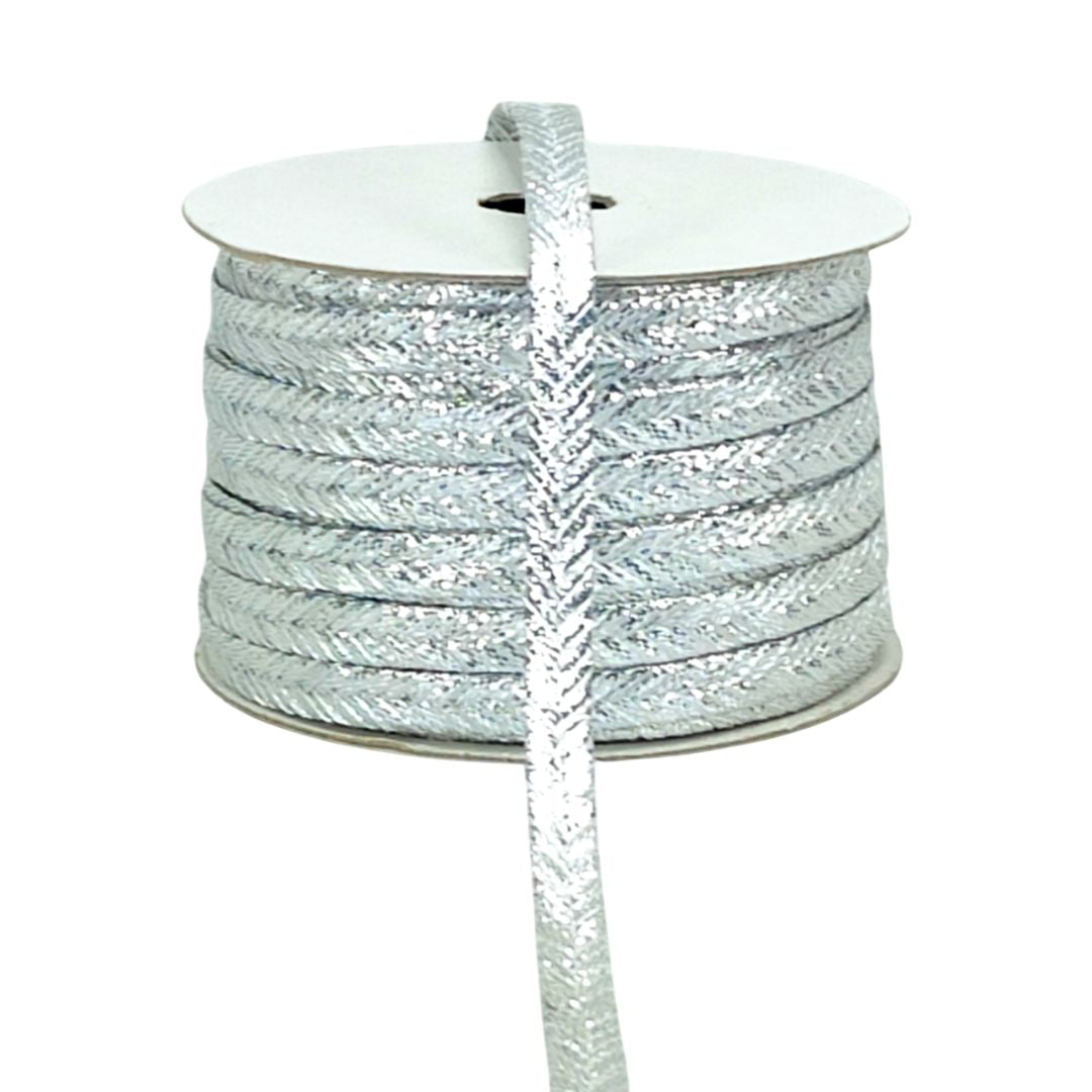 Spool of silver braided cord on a white background
