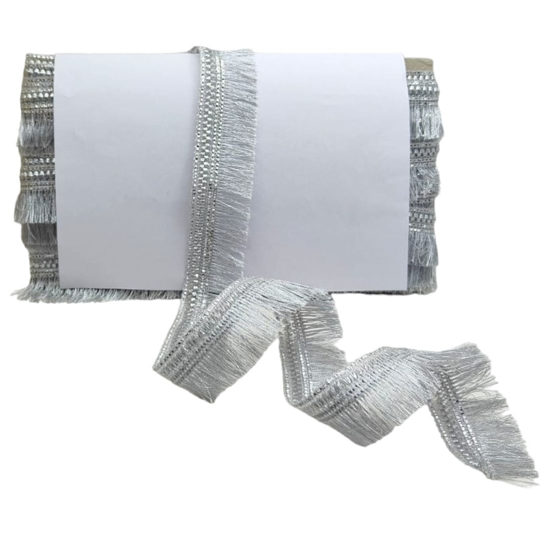 Silver fringe blanket on a white background