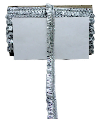 Silver fringe trim on a white background
