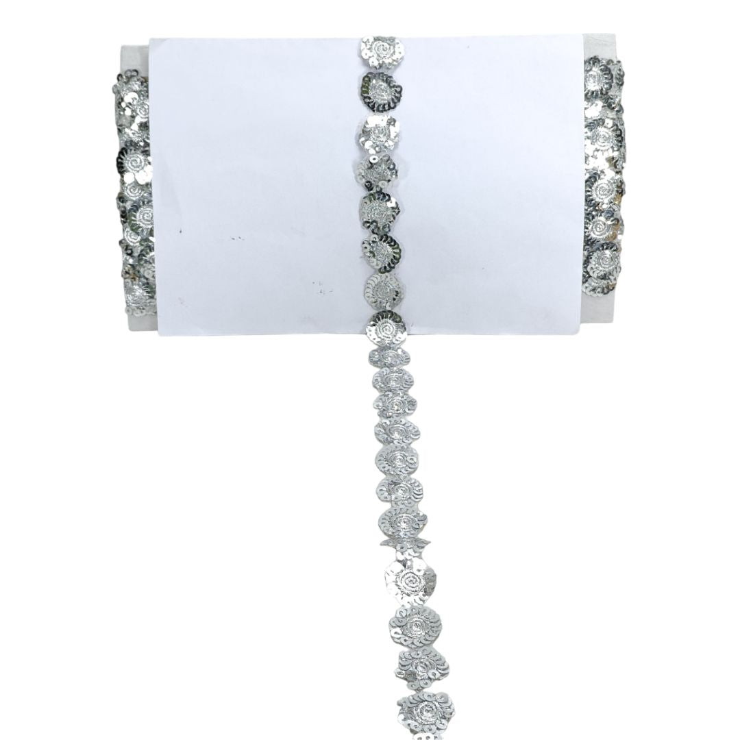 Silver floral bracelet on a white background