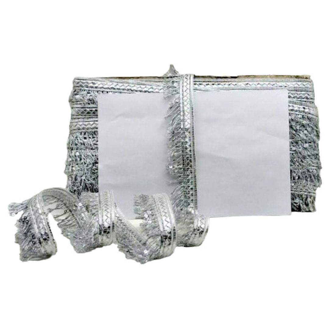 Silver reflective tape with white backing on a white background