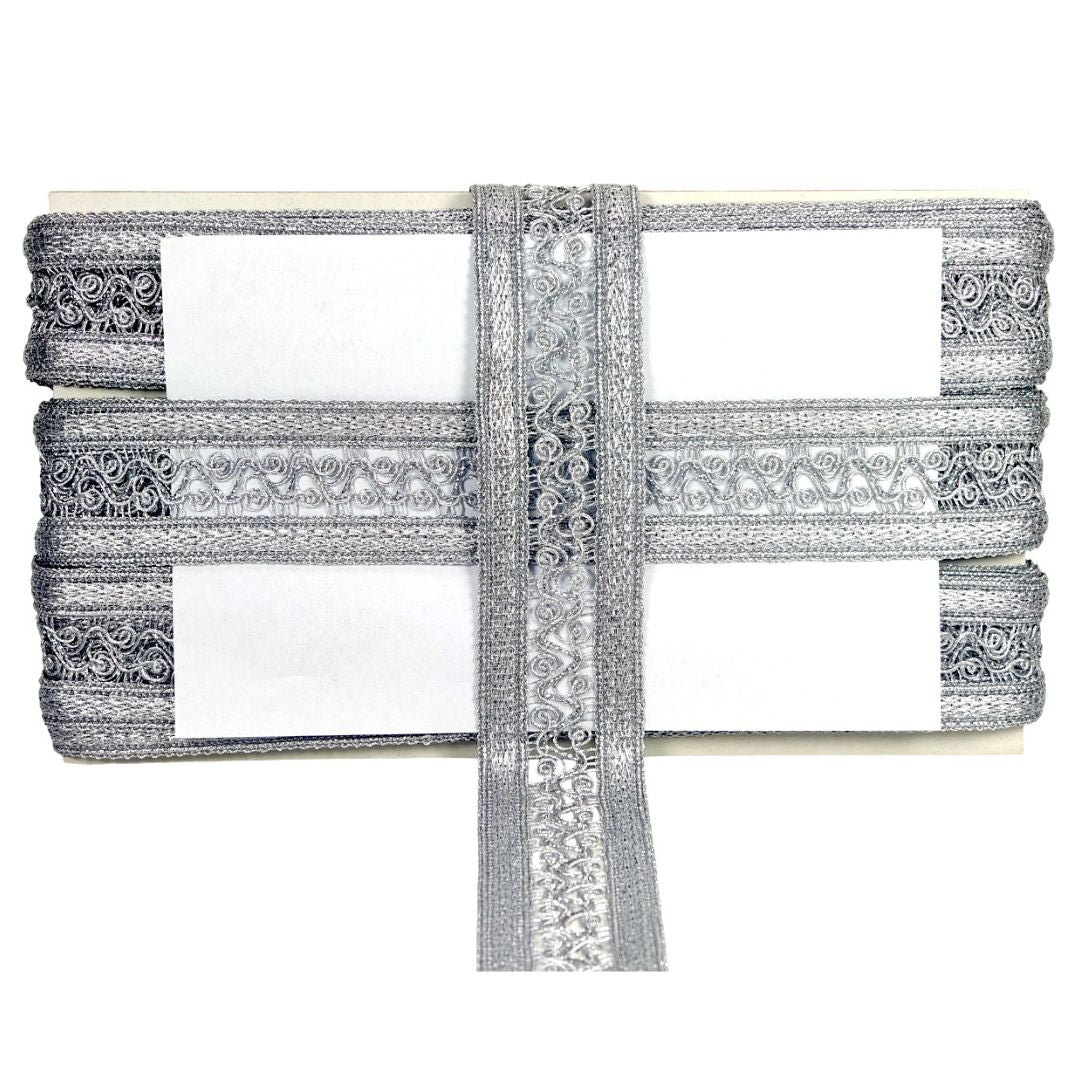 Decorative ribbon with intricate patterns on a white background
