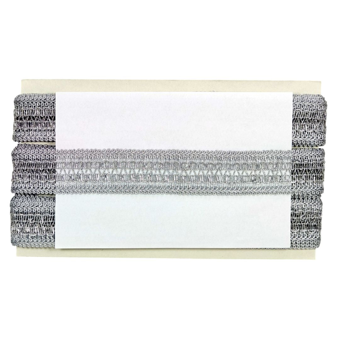 Stack of silver and gray textured fabric swatches on a white background