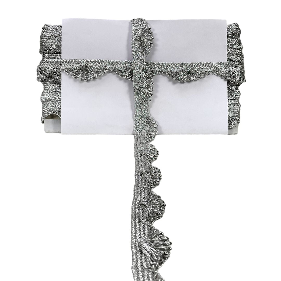 Decorative pillow with tassels on a white background