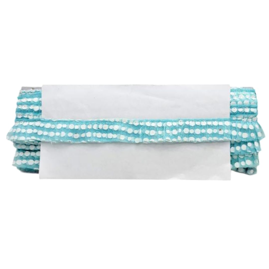 Folded fabric with blue and white pattern on a white background