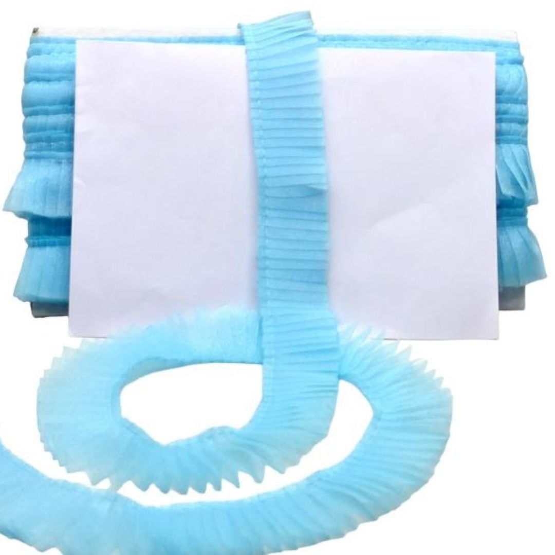 Set of blue plastic shower curtain rings with a white background