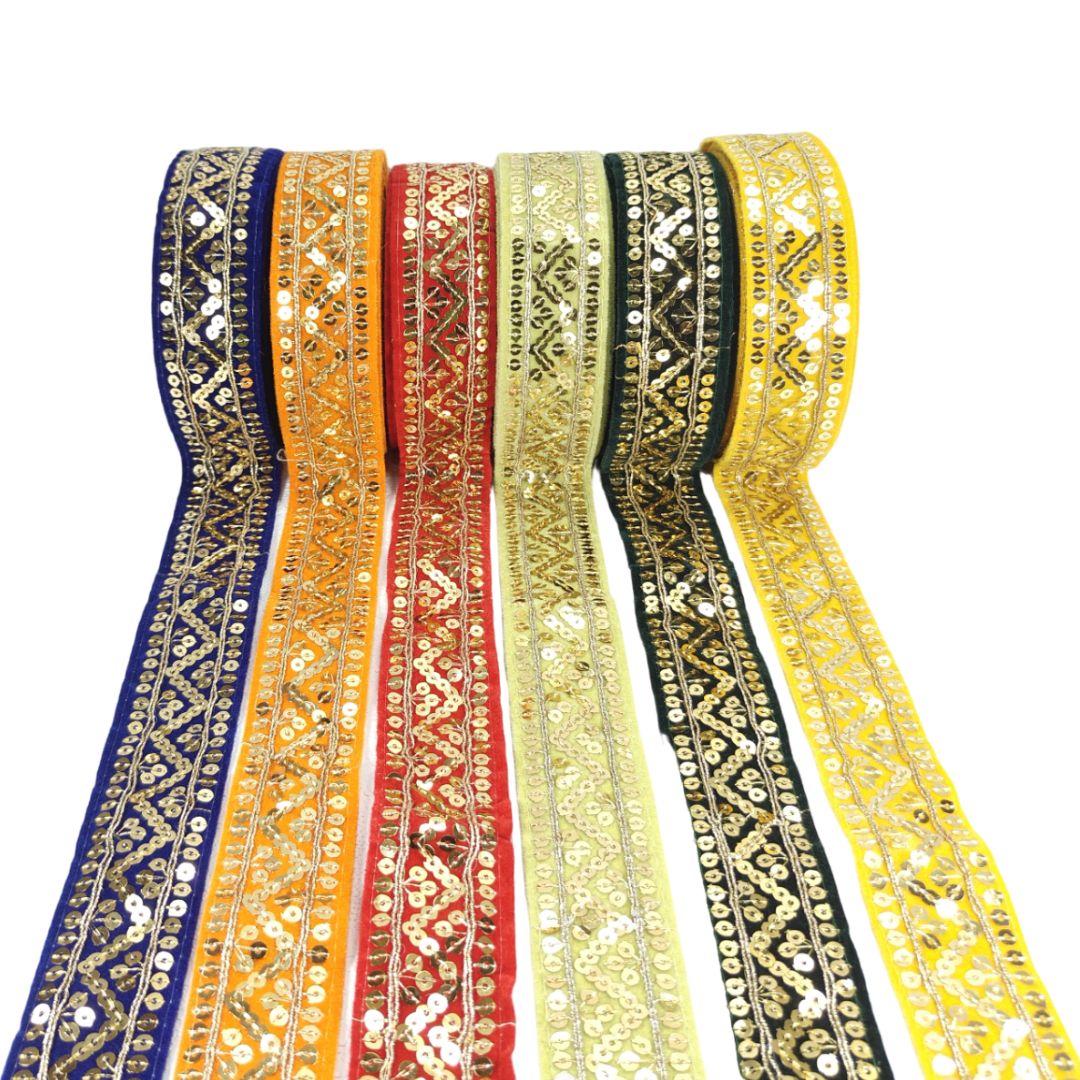 Set of colorful embroidered ribbons on a white background