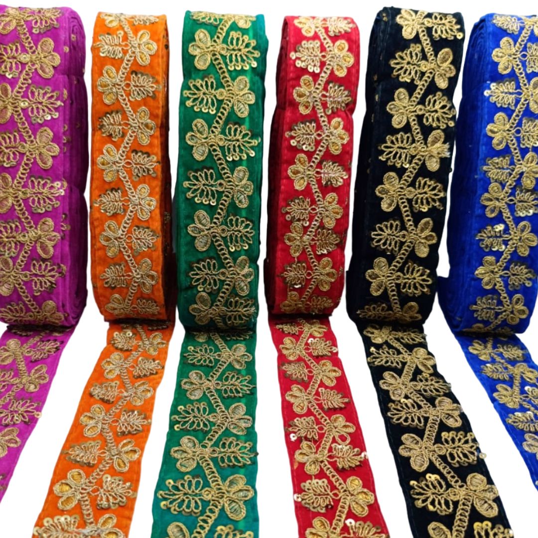 Set of ribbons with gold floral patterns in various colors on a white background