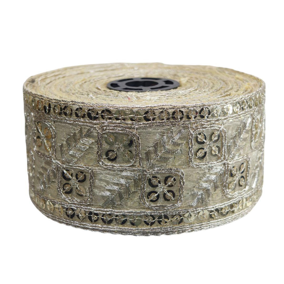 Roll of decorative ribbon with floral pattern on a white background
