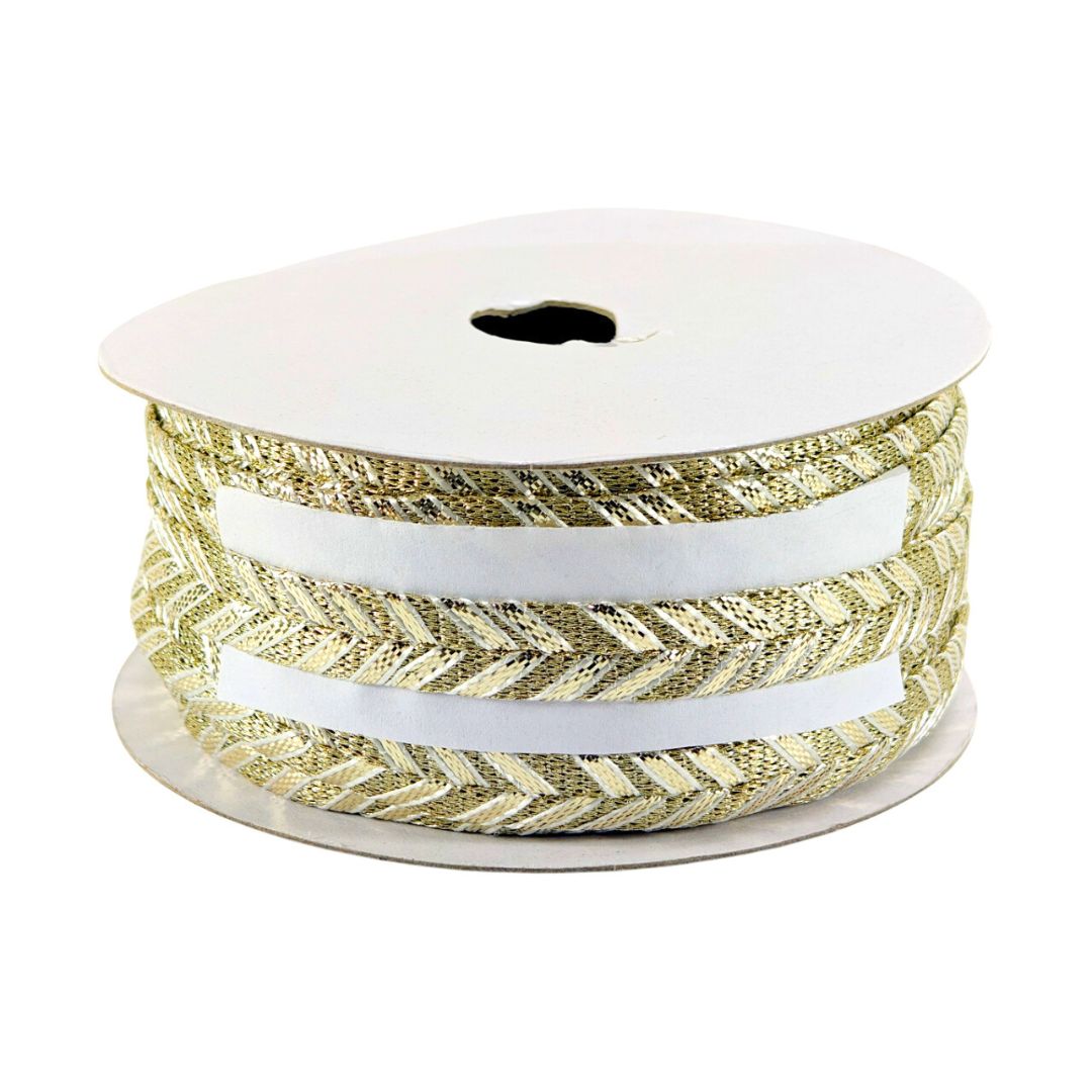 Spool of gold and white striped ribbon on a white background