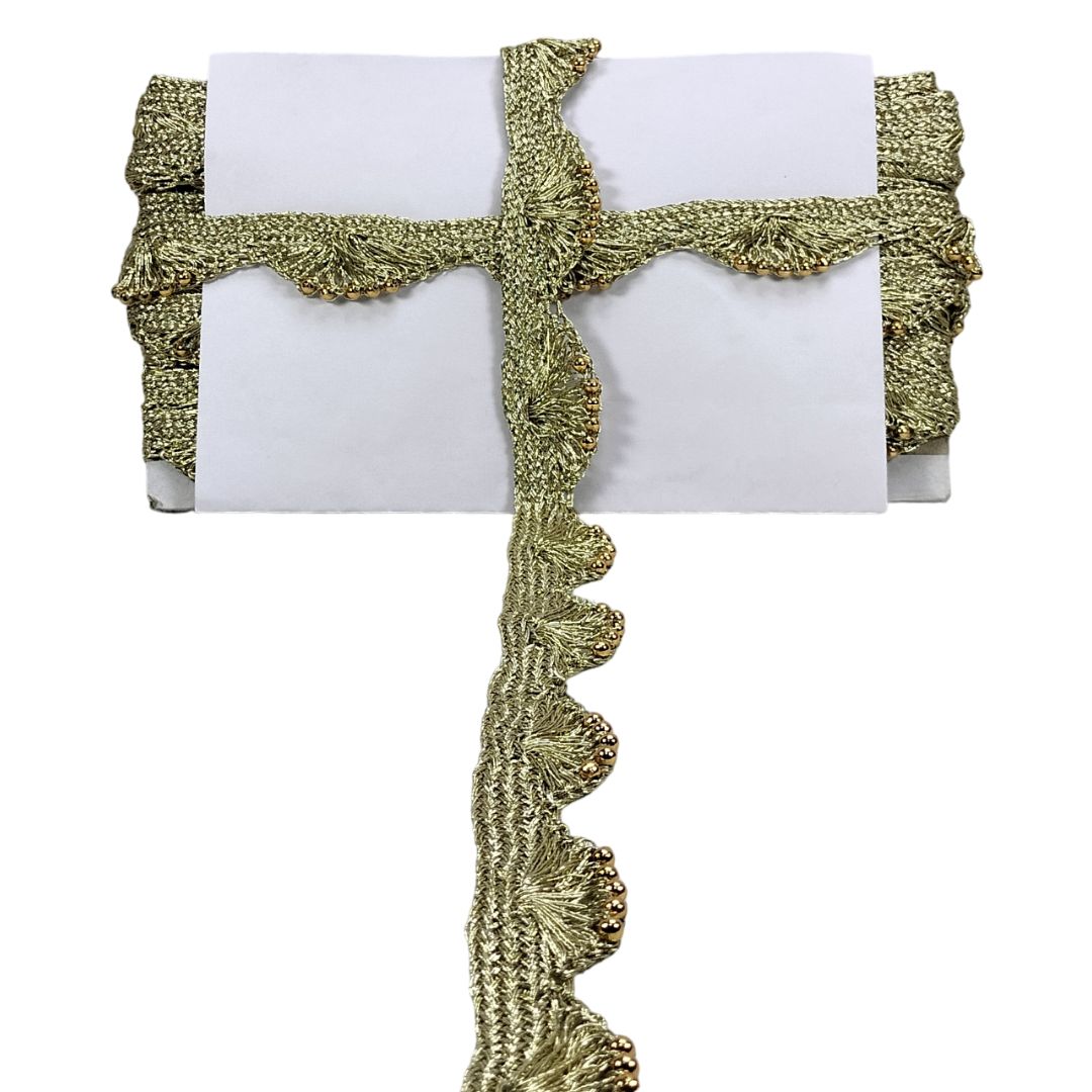 Gold decorative trim with scalloped edge on a white background