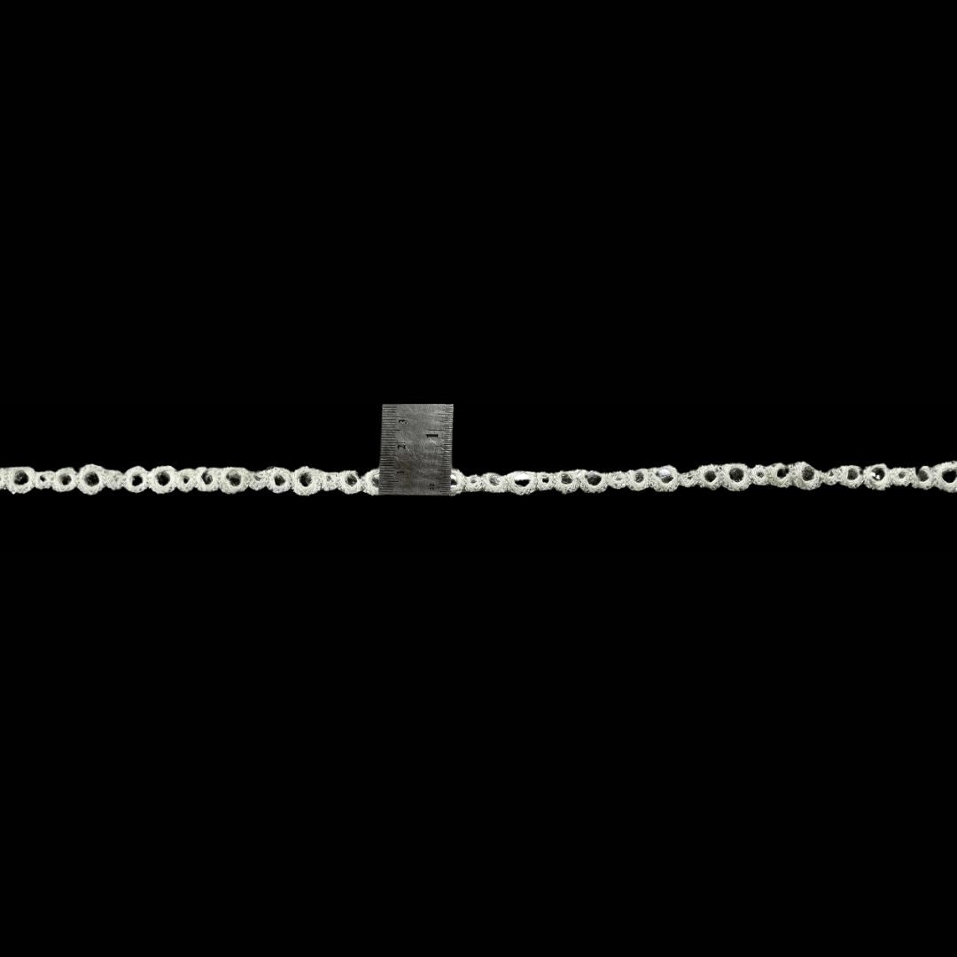 Metallic chain with a square padlock on a black background