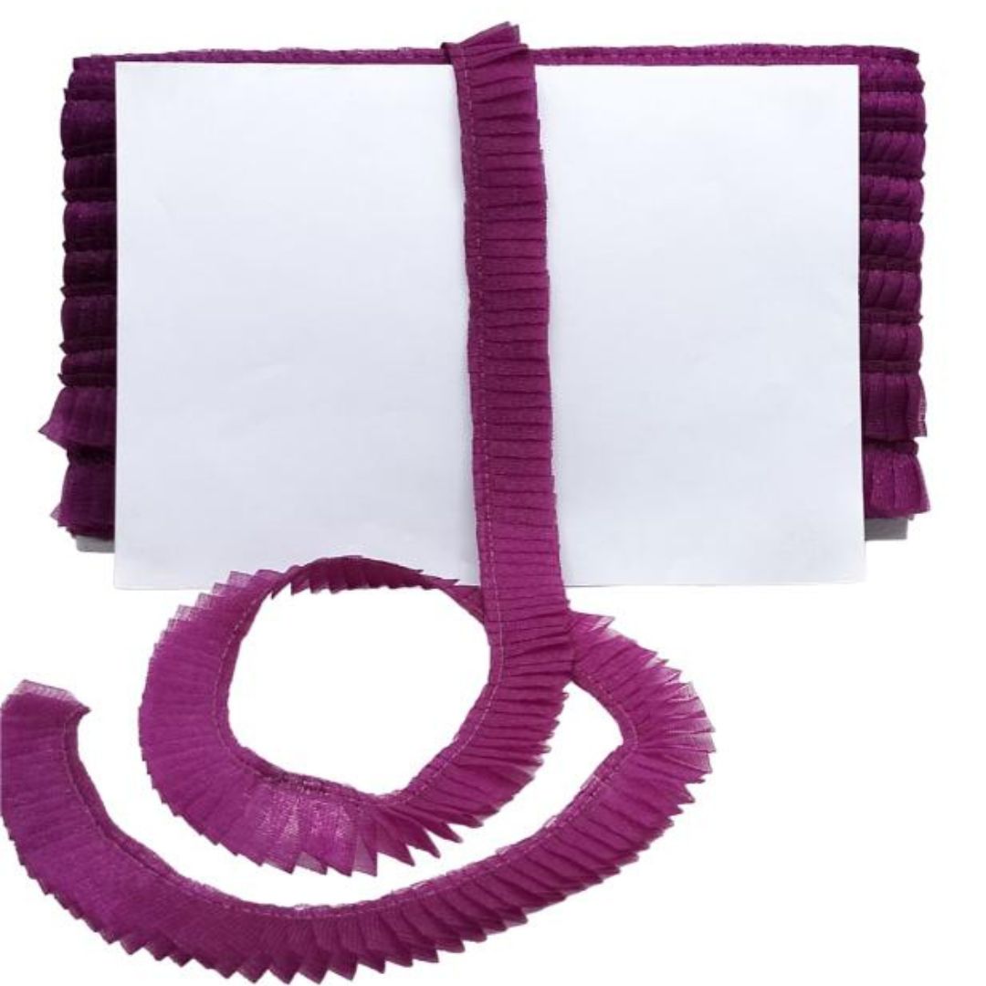 Purple ruffled trim on a white background