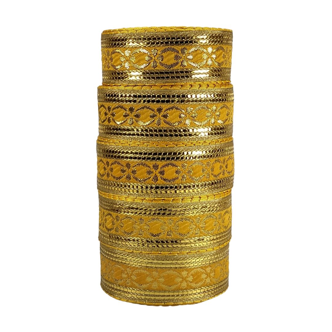 Stack of gold bangles on a white background