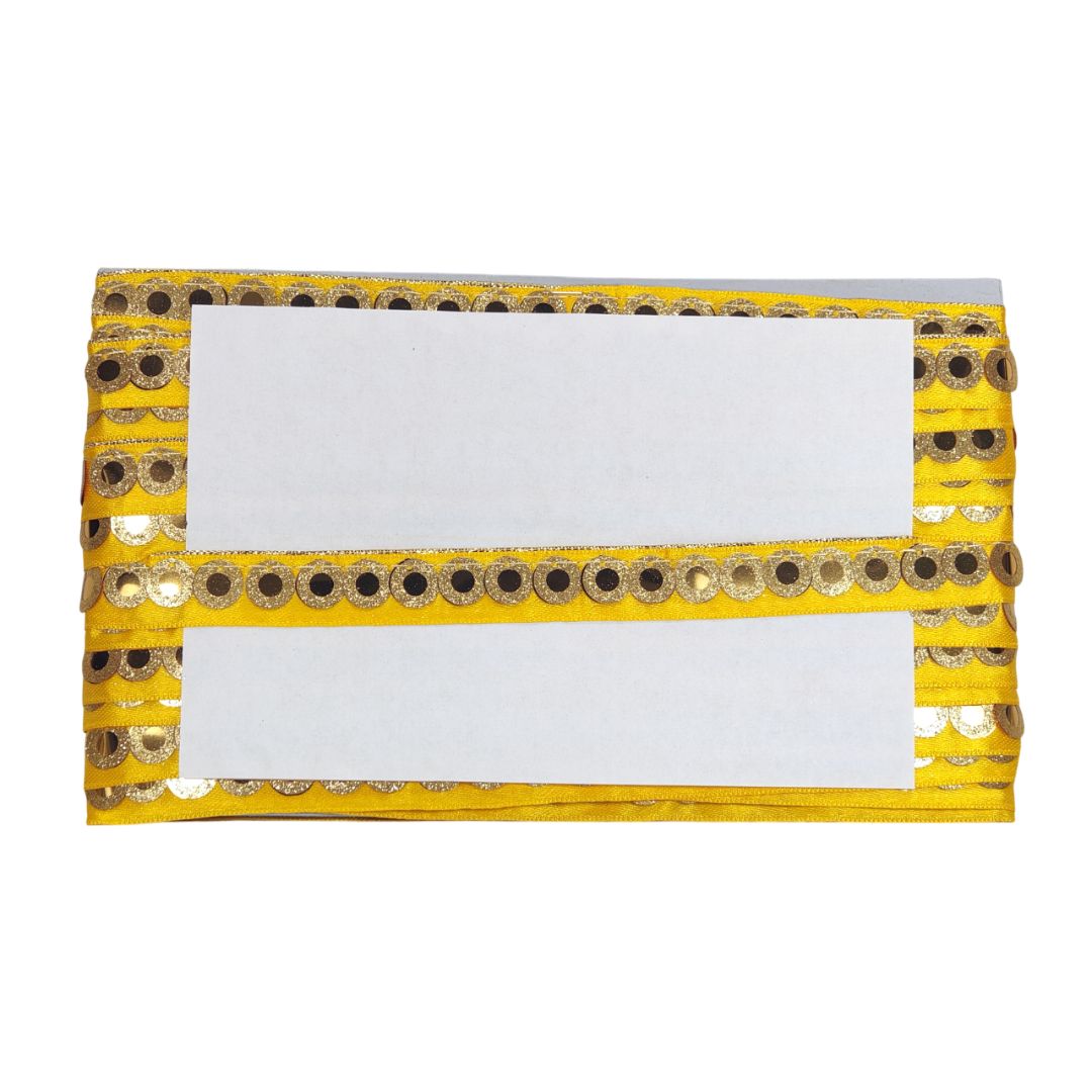 Yellow clutch bag with decorative patterns on a white background
