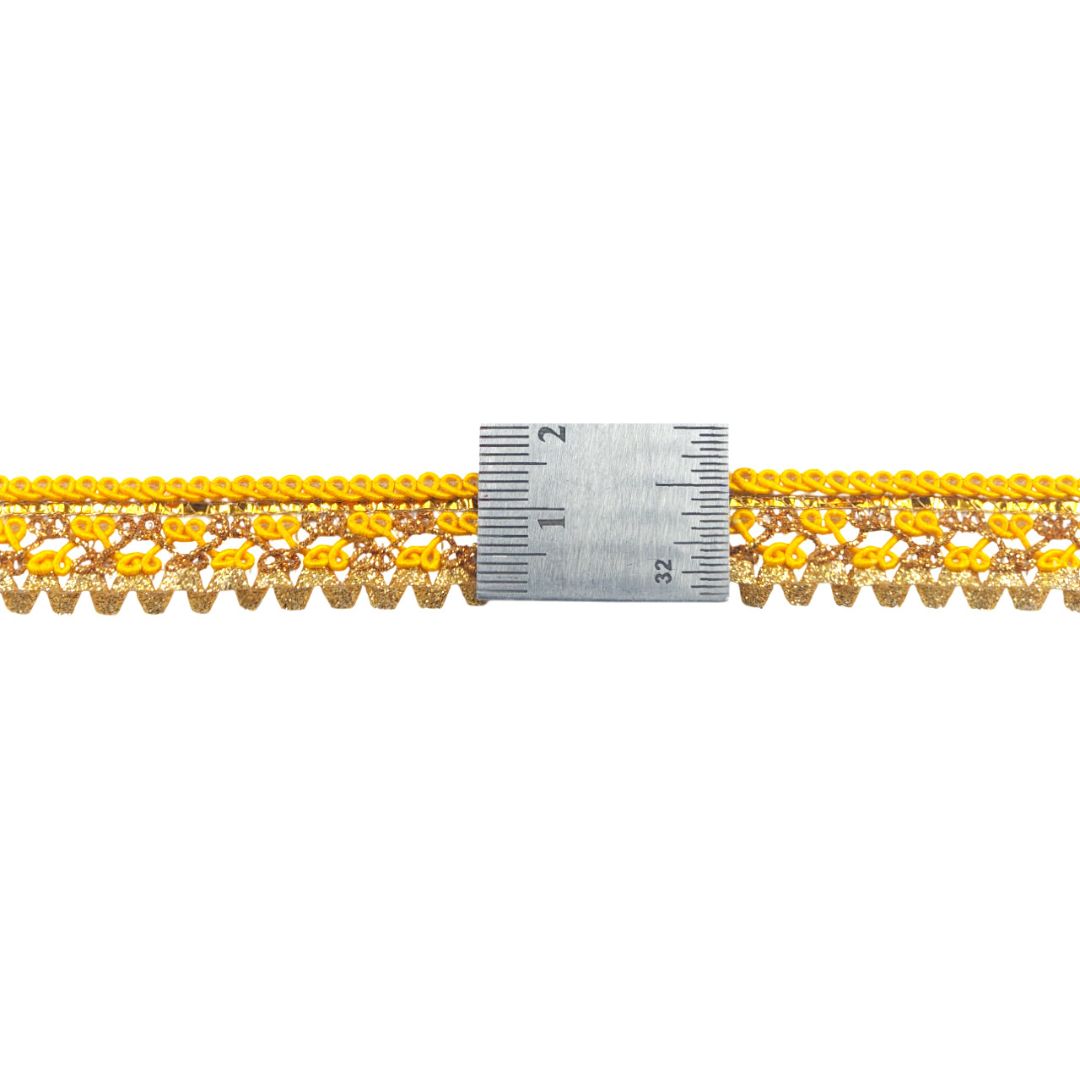 Yellow lace trim with a ruler for measurement on a white background