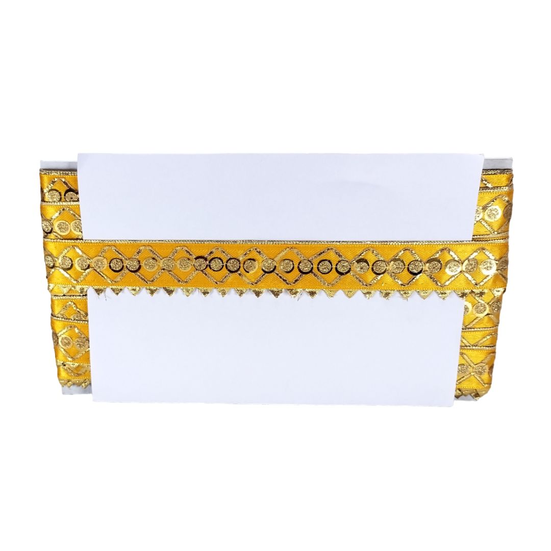 Decorative yellow and gold table runner on a white background