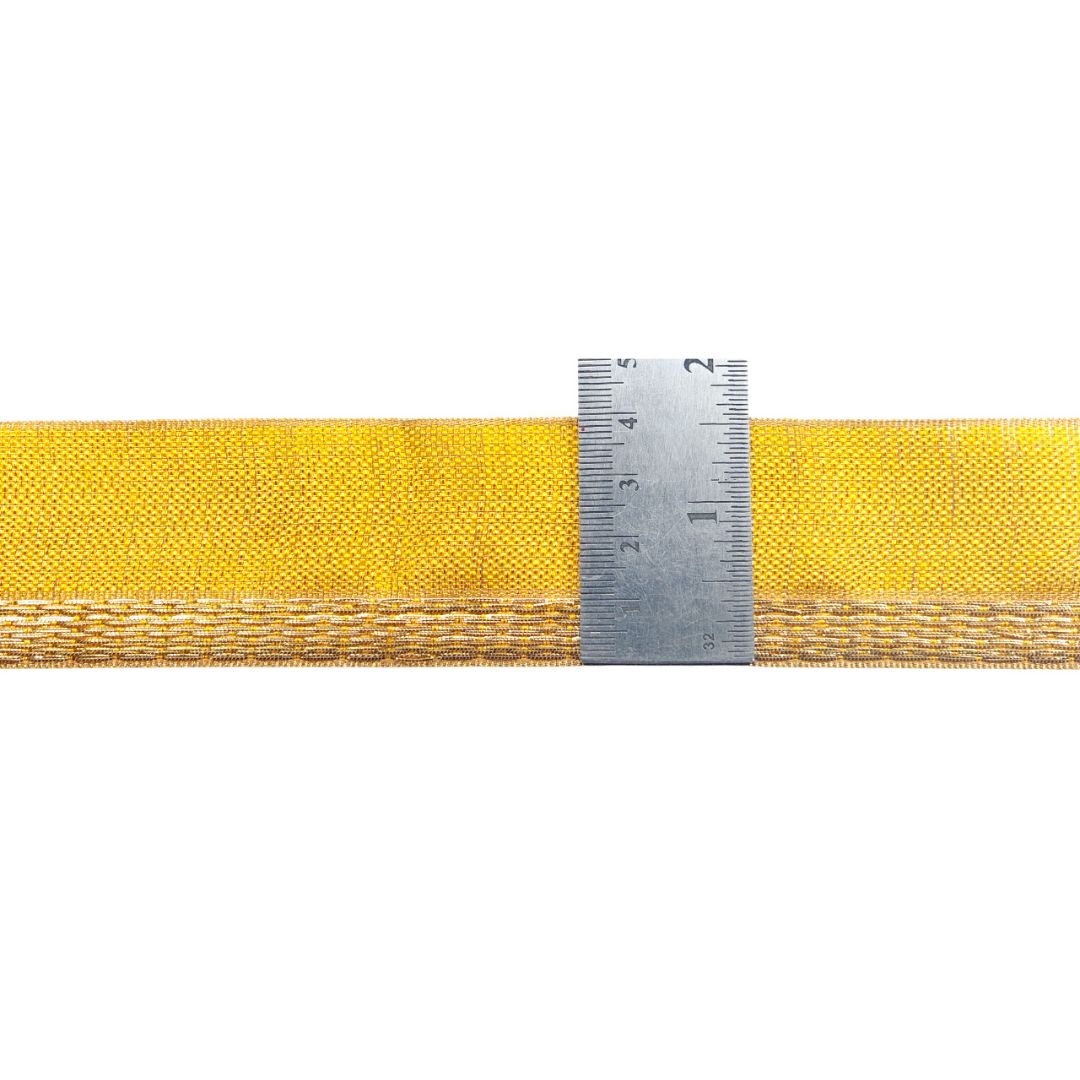 Yellow webbing strap with a ruler for scale on a white background