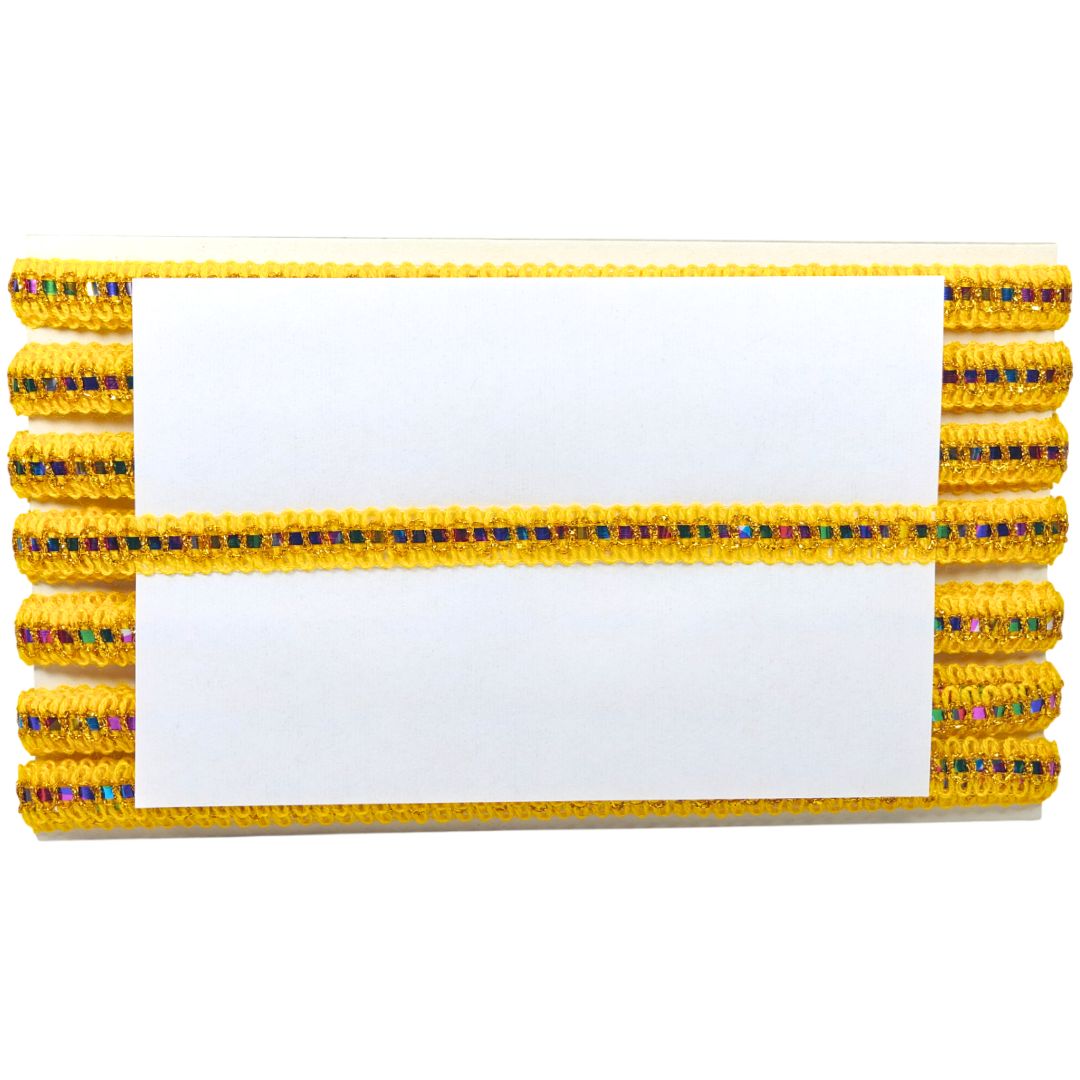 Yellow ribbon with decorative elements on a white background