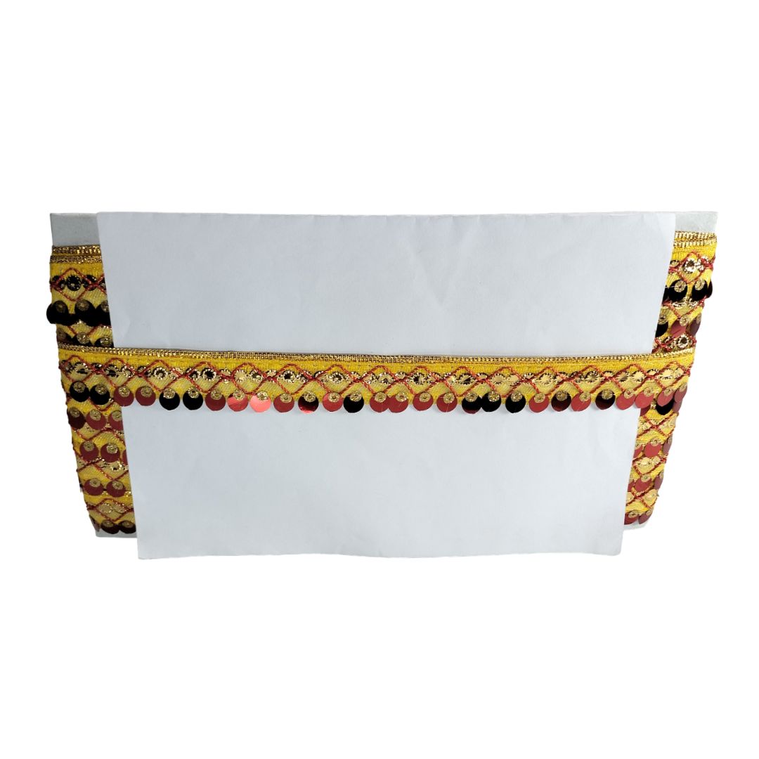 White blouse with yellow and black decorative border on a white background