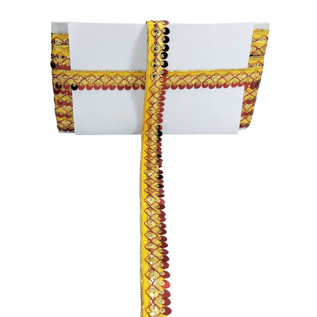 White saree with decorative yellow and red border on a white background