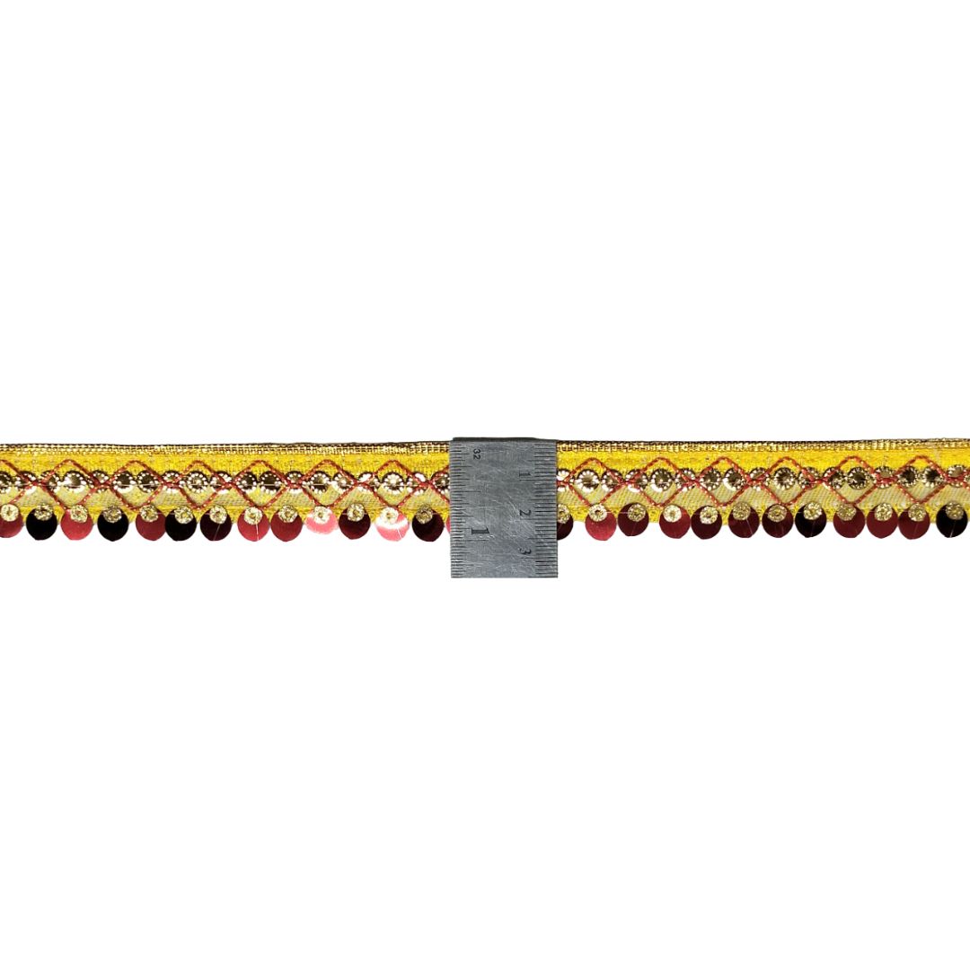 Decorative border with gold, red, and black pattern on a white background