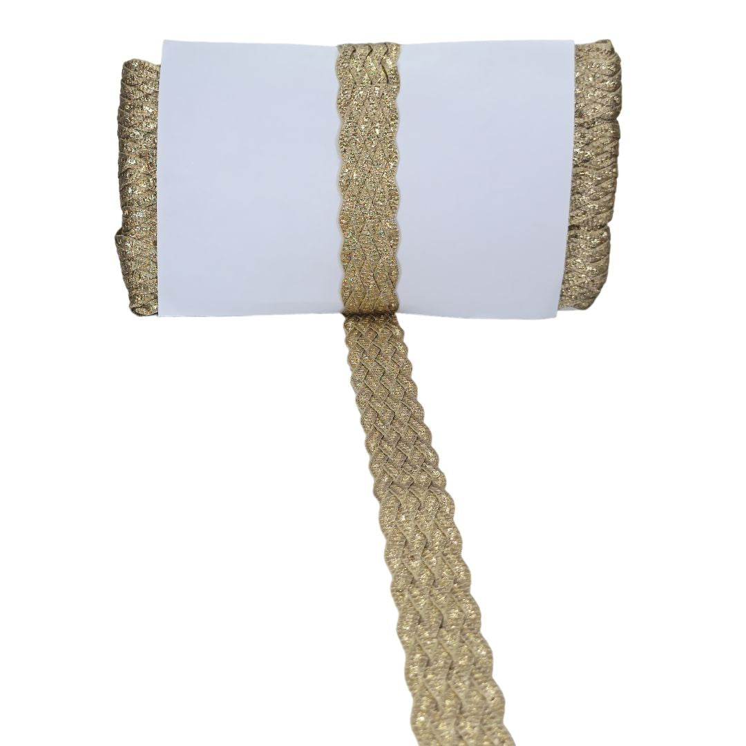 White paper roll with gold decorative trim on a white background