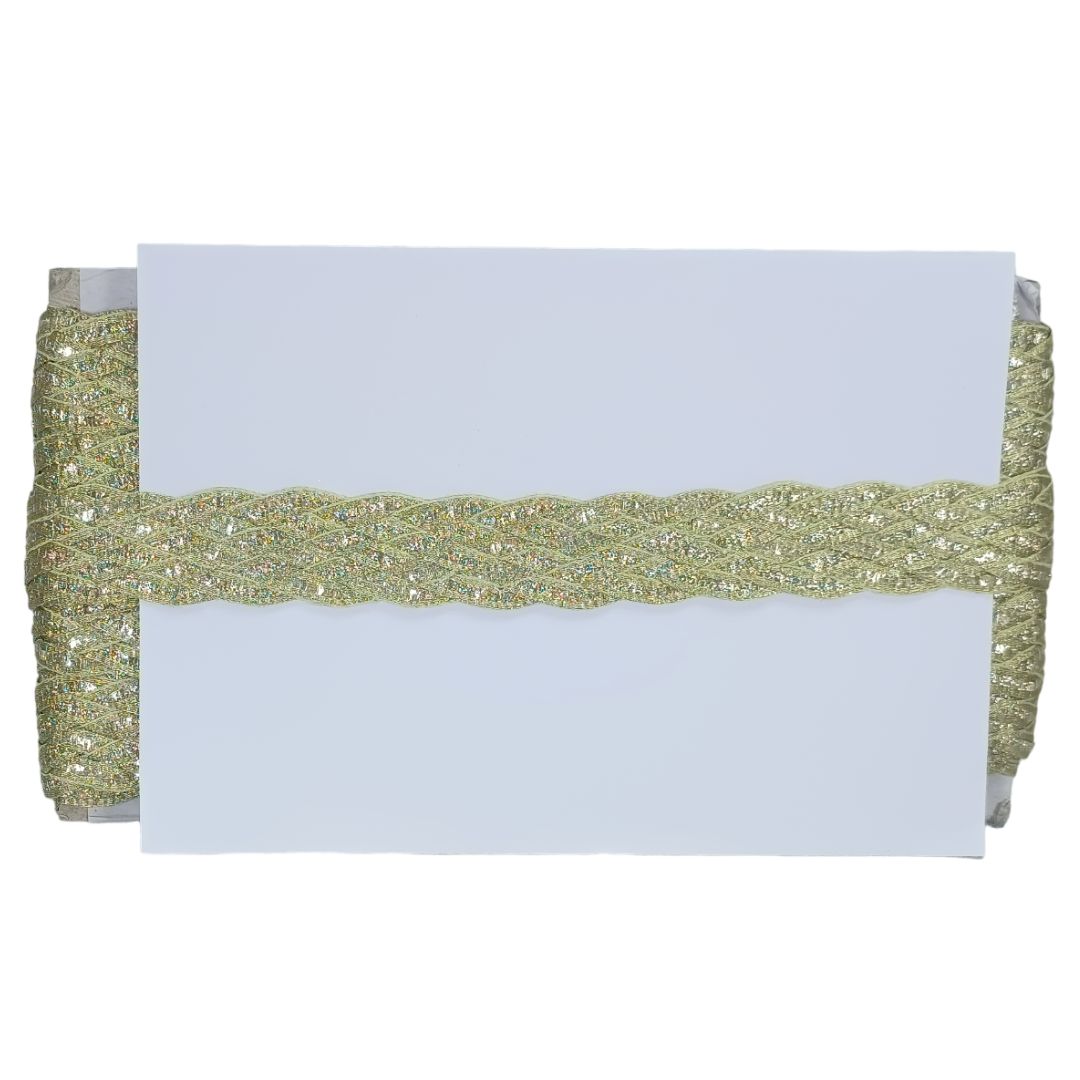 Gold glittery ribbon with a white card on a white background