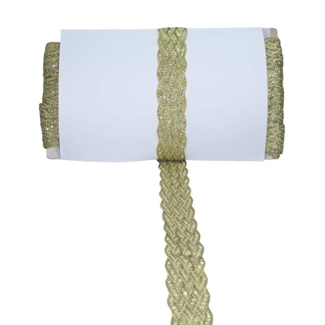 White towel with green braided border on a white background