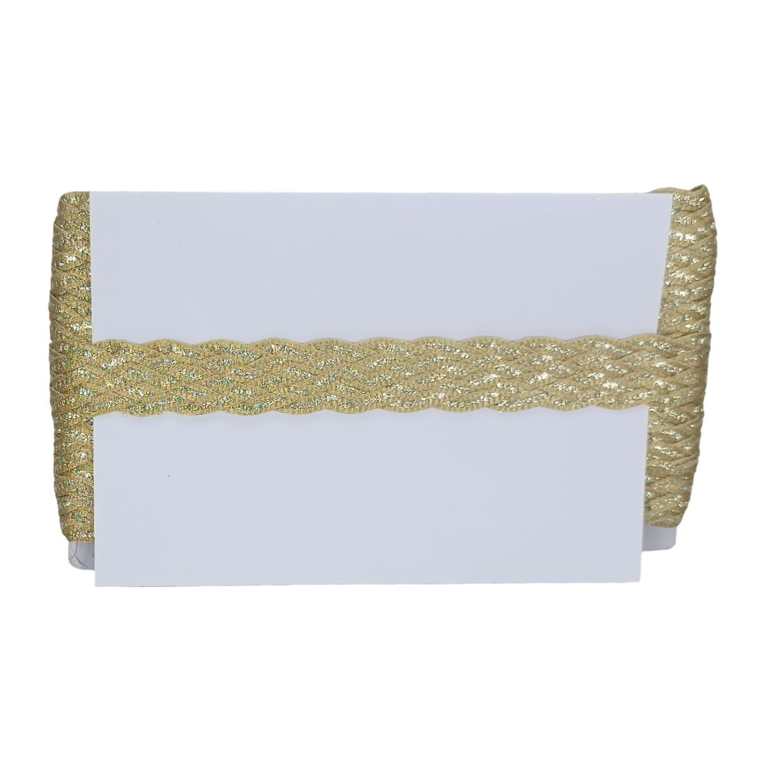 White clutch with gold glittery edge on a white background