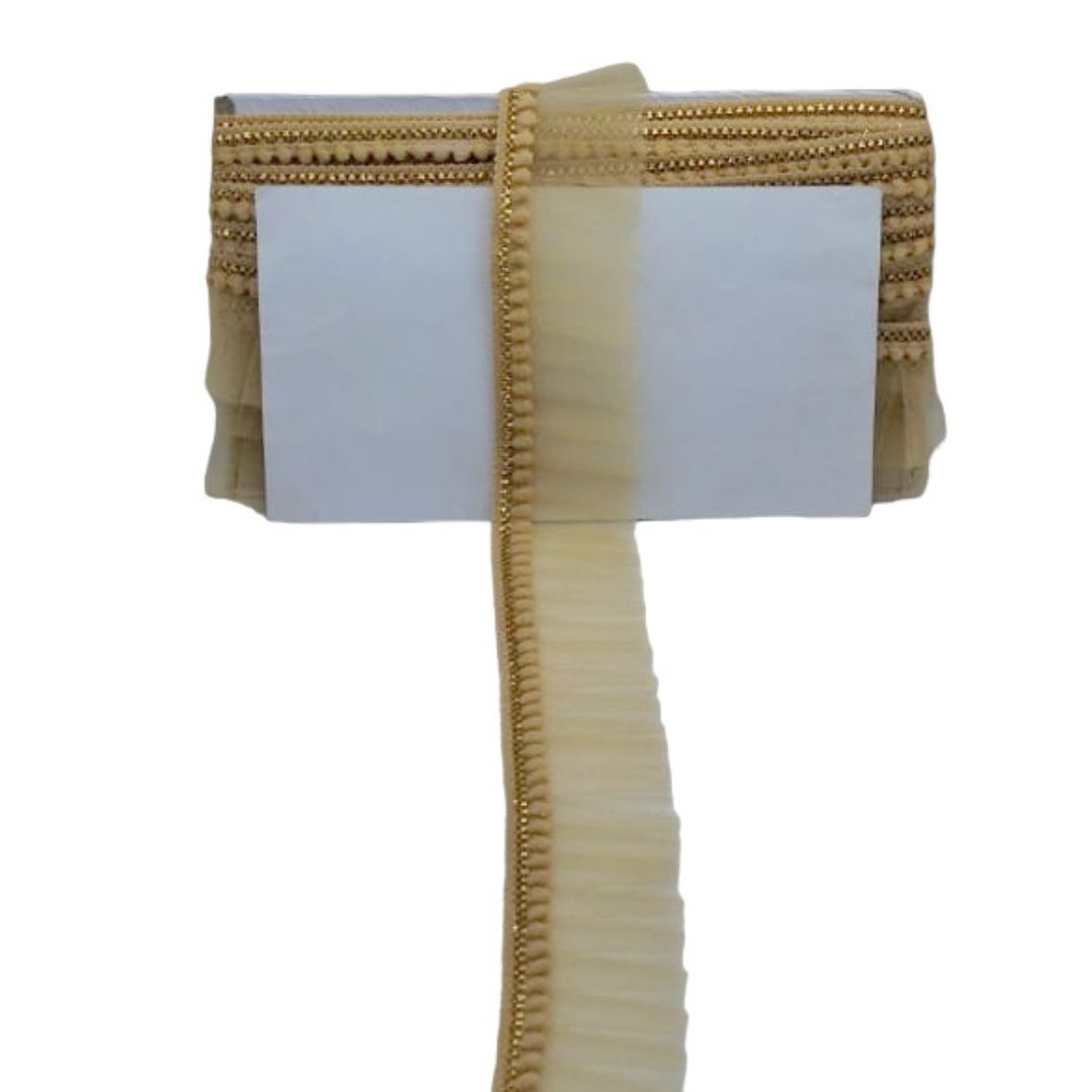 Gold decorative ribbon with a white card on a white background