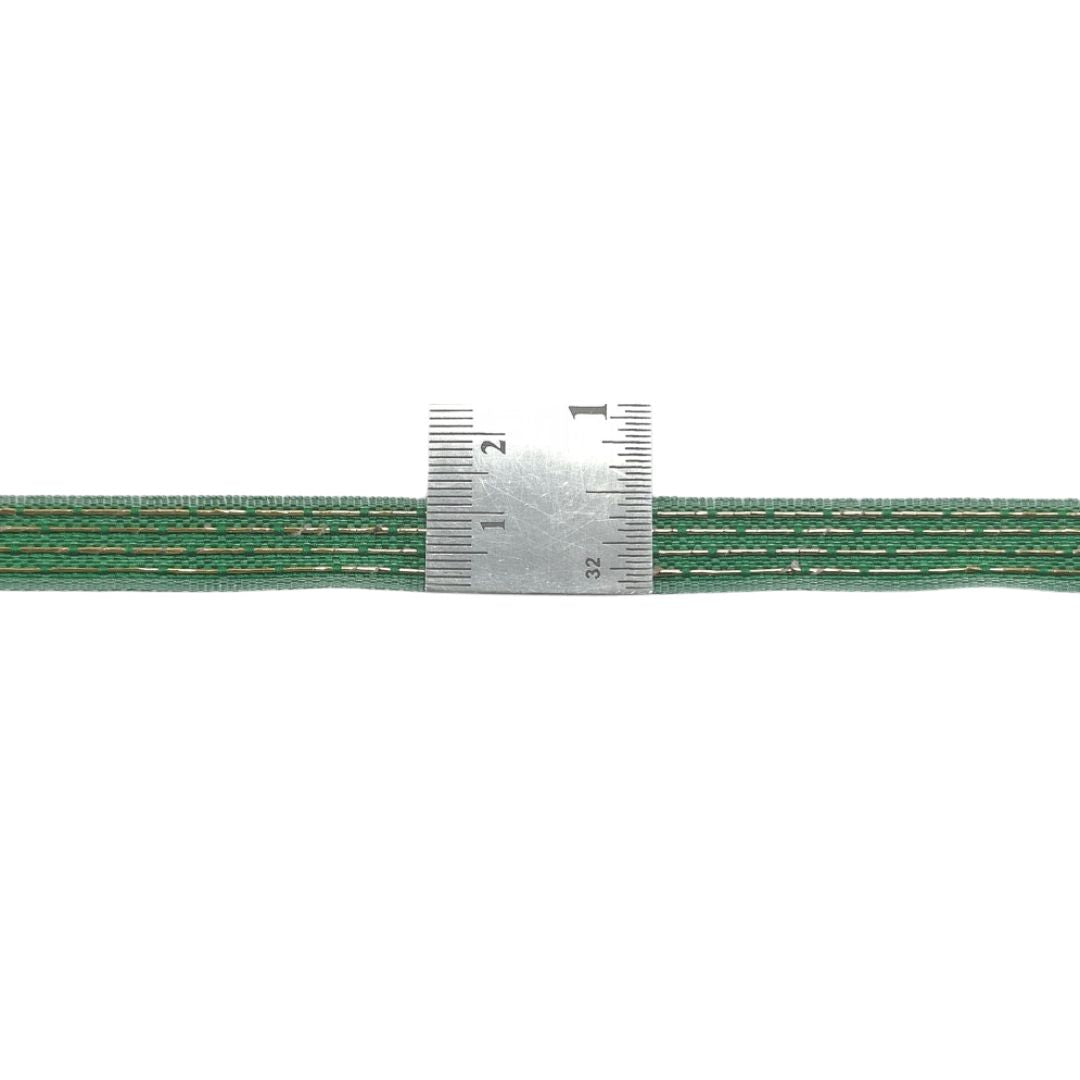 Green braided cable with a ruler for scale
